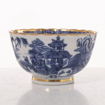 A group  of three serving dishes, a serving bowl, a cup, and seven plates, porcelain, including China 18th century.