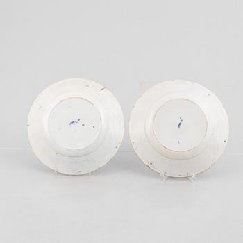 A pair of Peacock pattern earthenware plates, presumably De Klauw, The neatherlands, around 1800.