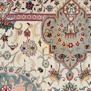 A Tabriz, carpet, 310 x 195 cm. signed.