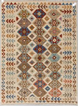 An oriental kilim, around 232 x 170 cm.