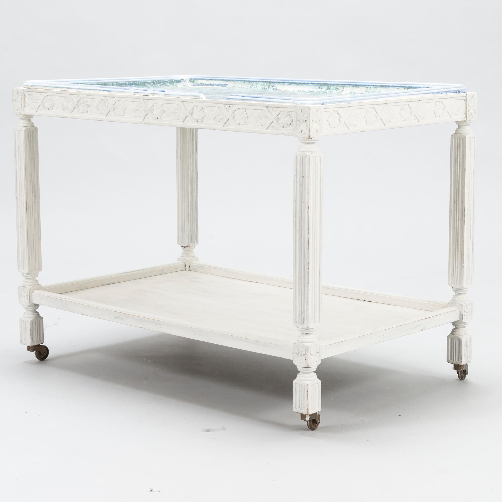 BIRGER KAIPIAINEN, A tray table/tea trolley signed Kaipiainen 1942, Arabia.