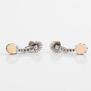 Opal and round brilliant cut diamond earrings.