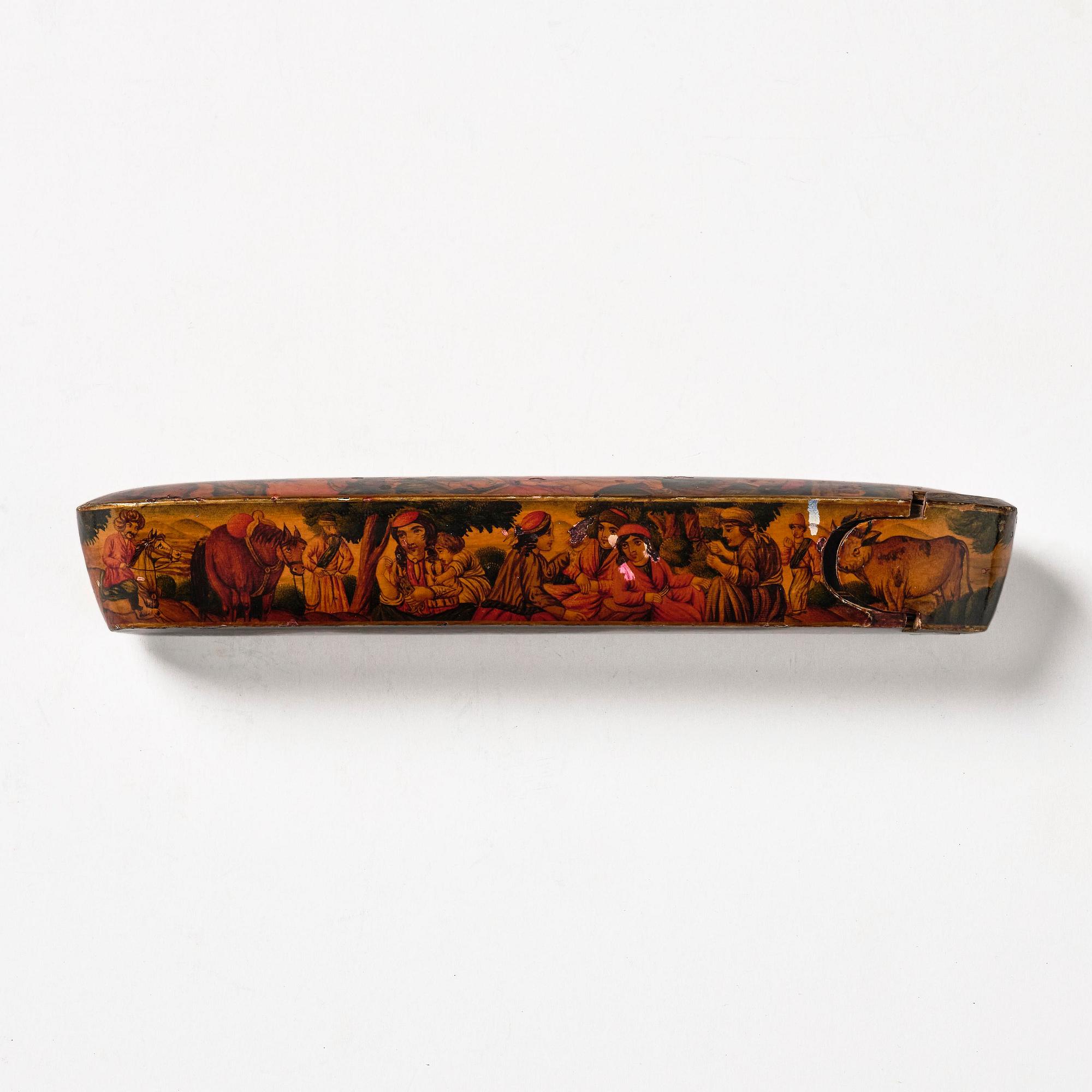 A Qajar papier-mâché polychrome lacquer Qalamdan, Persia, first half of the 19th century.