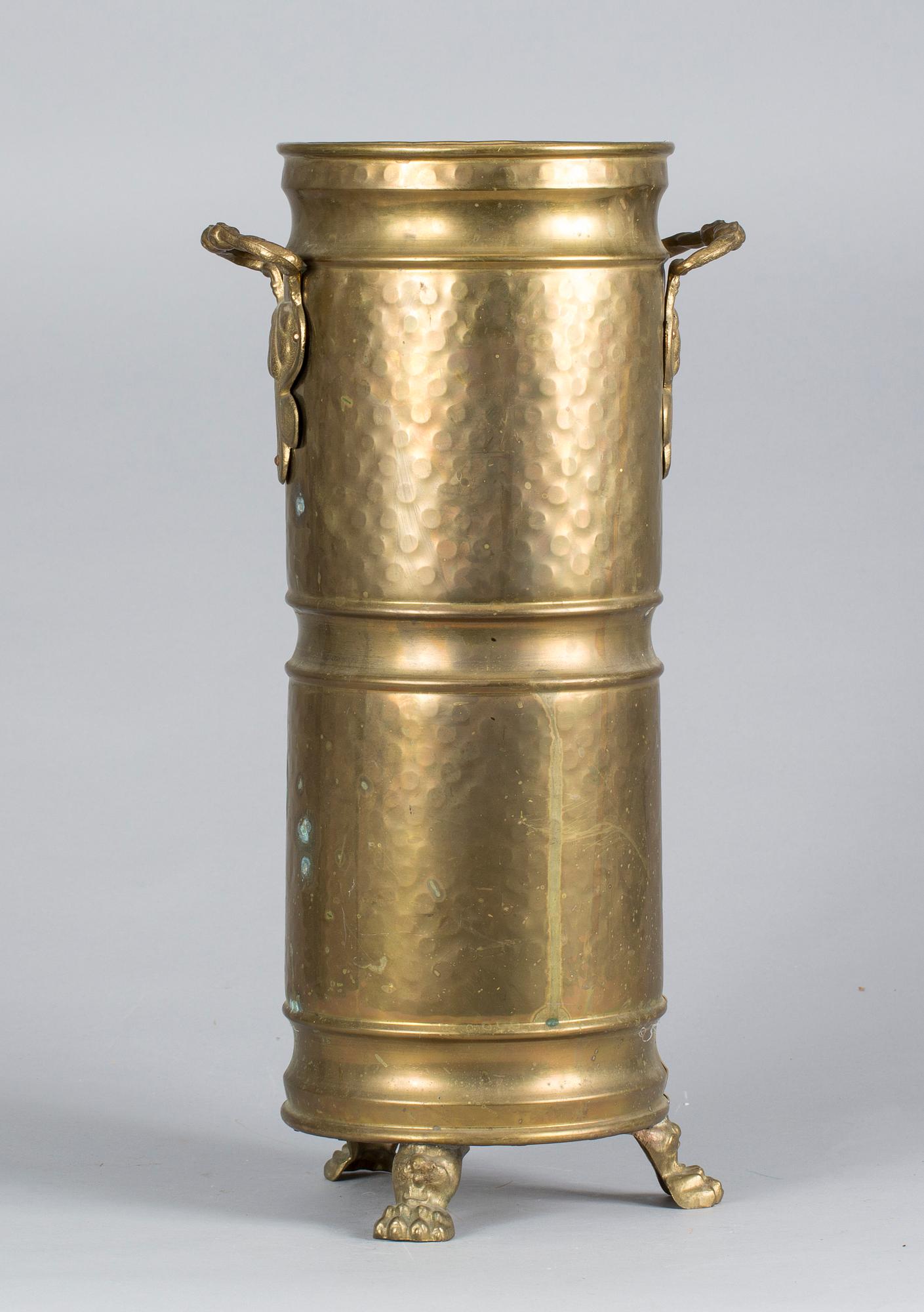 PARAPLYSTÄLL, mässing, 1900-talets första hälft.