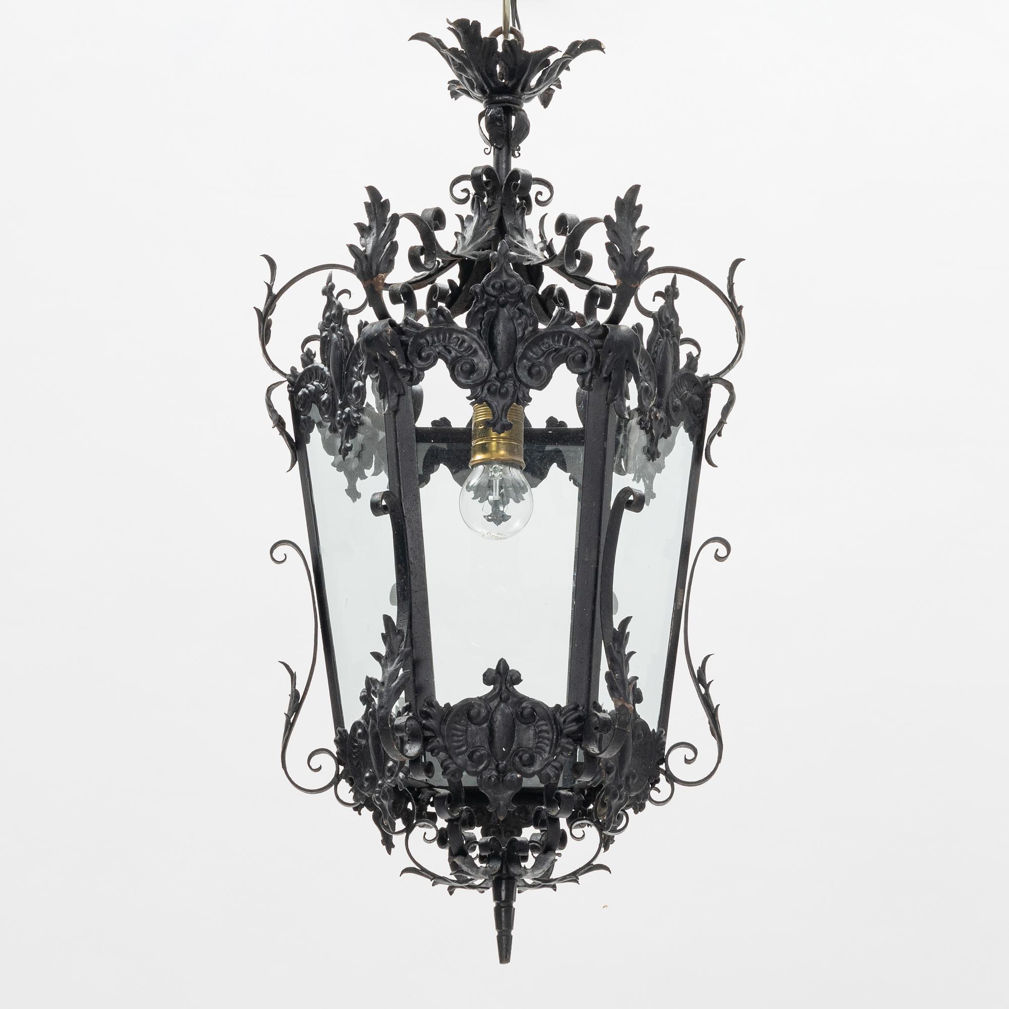 A painted metal lantern, Spain, 20th Century.
