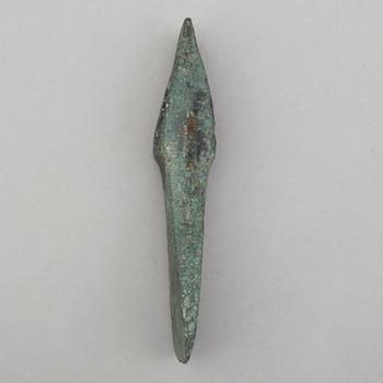 A bronze axe, 1500-500 B.C.