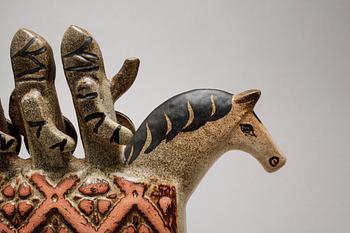 LISA LARSON, a stoneware figurine for K-studion at Gustavsberg, signed, second half of the 20th century.