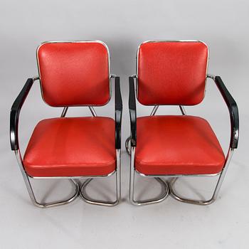 Two 1930/1940's armchairs / hairdressing chairs.