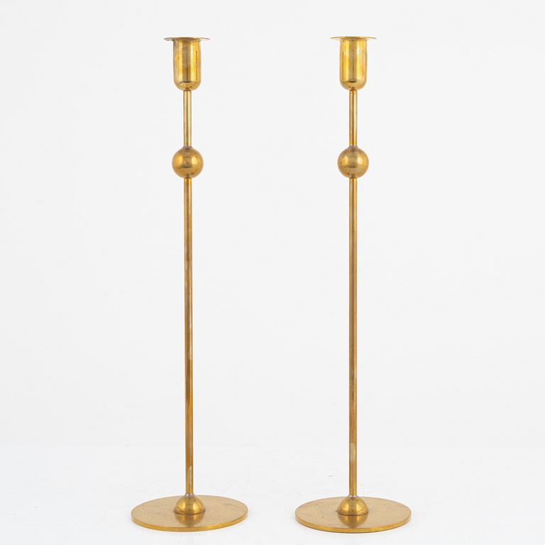 Estrid Ericson, a pair of "Kulan" candlesticks, Firma Svenskt Tenn.