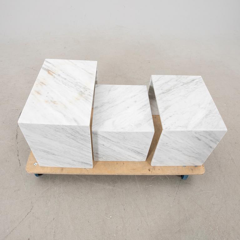 A three piece marble coffee table from the second half of the 20th century.