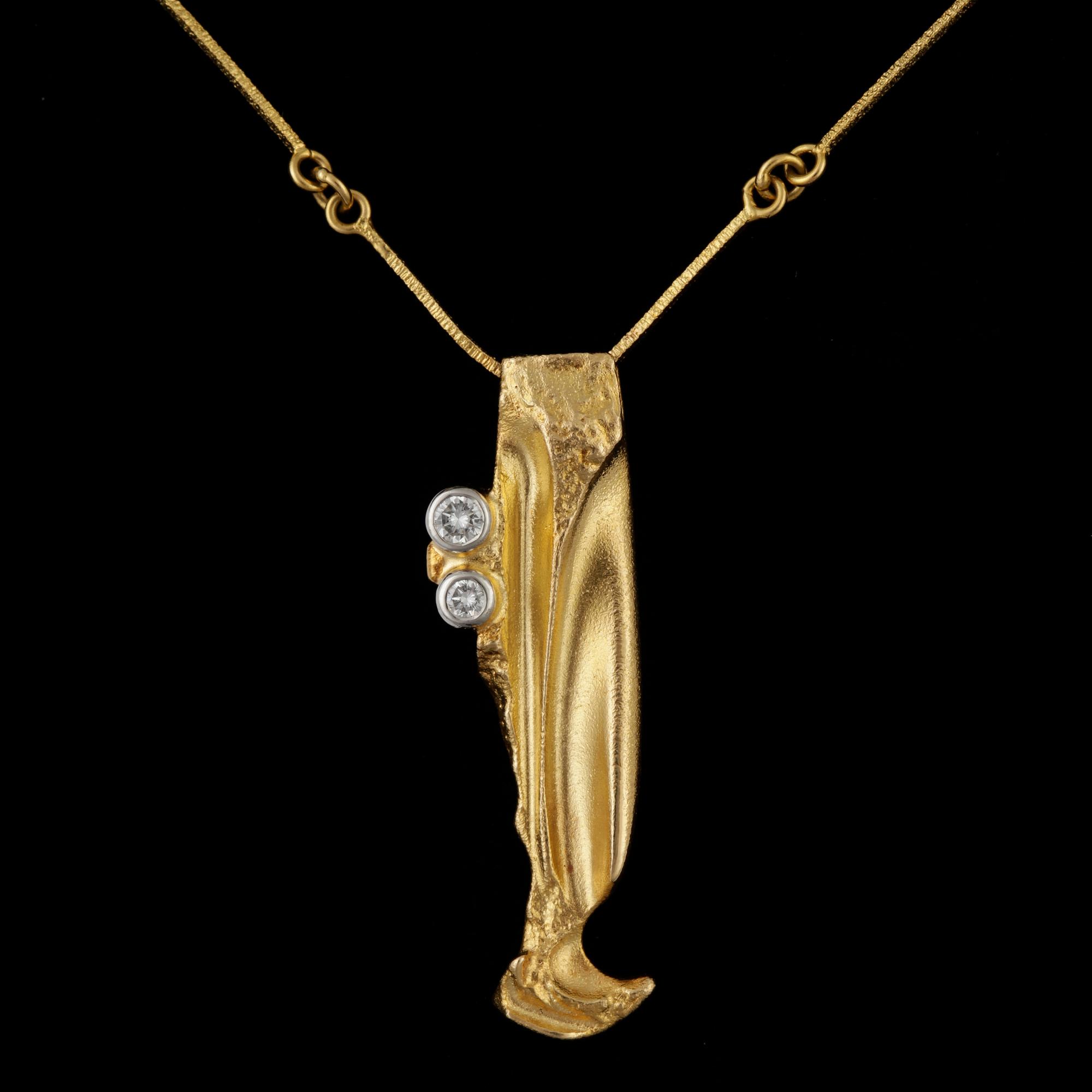 COLLIER, 18k guld med 2 briljantslipade diamanter tot ca0,06 ct. Lapponia, Finland, 1987. Vikt 8,2g.