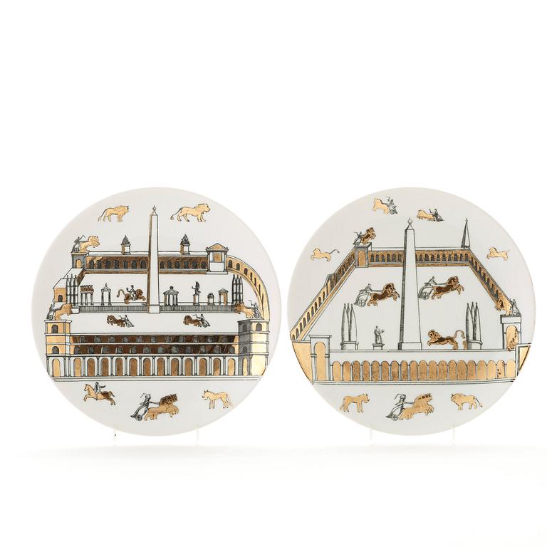 Piero Fornasetti, a set of eleven porcelain plates, Milano, Italy.