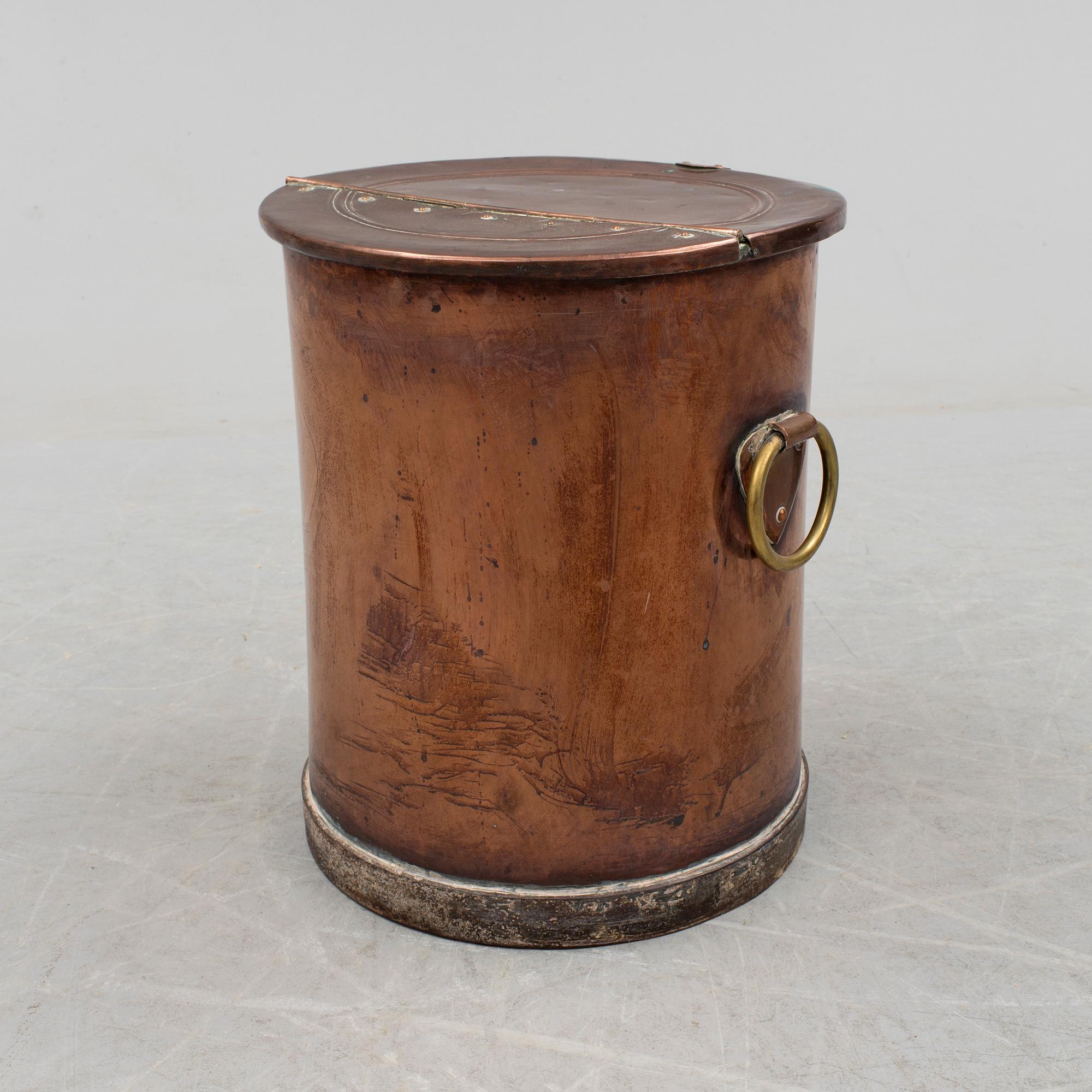 A copper water container, around the year 1900.