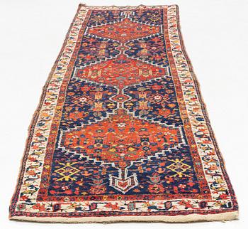 An antique runner, probably Karadja, circa 360 x 98 cm.