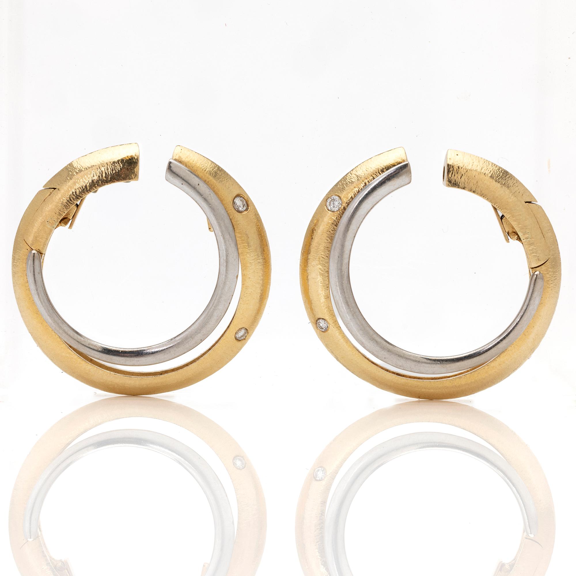 Ole Lynggaard, 18K gold and diamond hoop earrings.