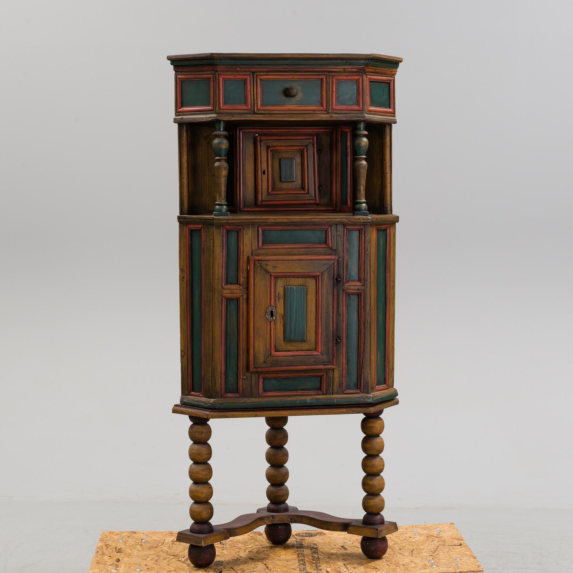 A 18th century corner cabinet.