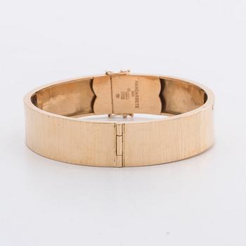 An 18K gold bracelet, 1980, 64g.
