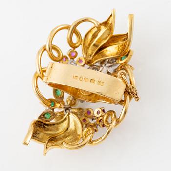 A Strömdahls bracelet/pendant combination in 18K gold with rubies, emeralds, pearls and diamonds.