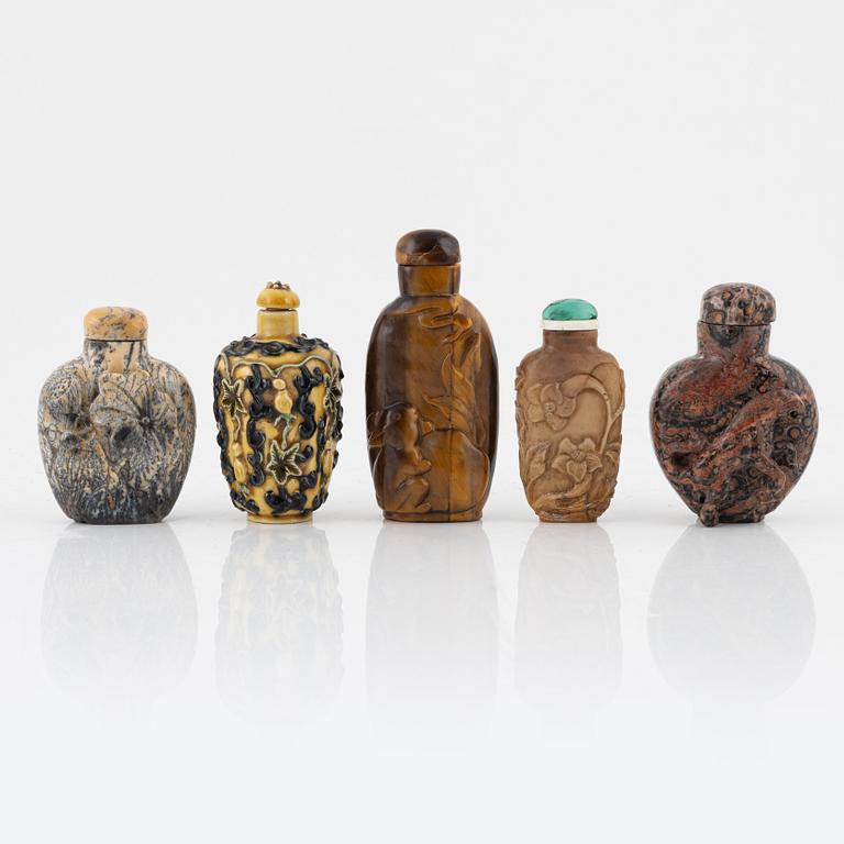 Ten snuff bottles, mottled stone, China, 20th century.