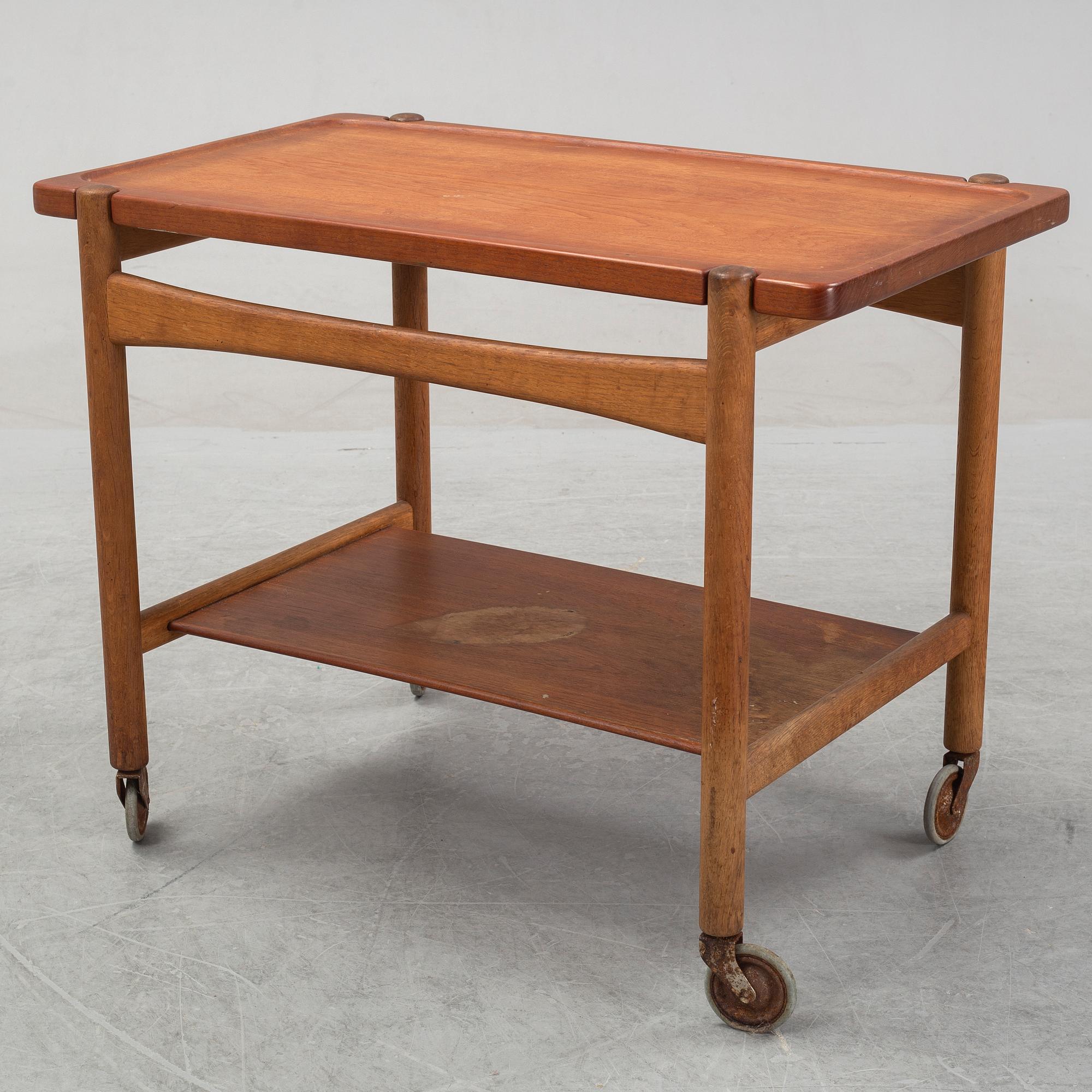 Hans J Wegner, a teak and oak serving trolley from Andreas Tuck, Denmark.