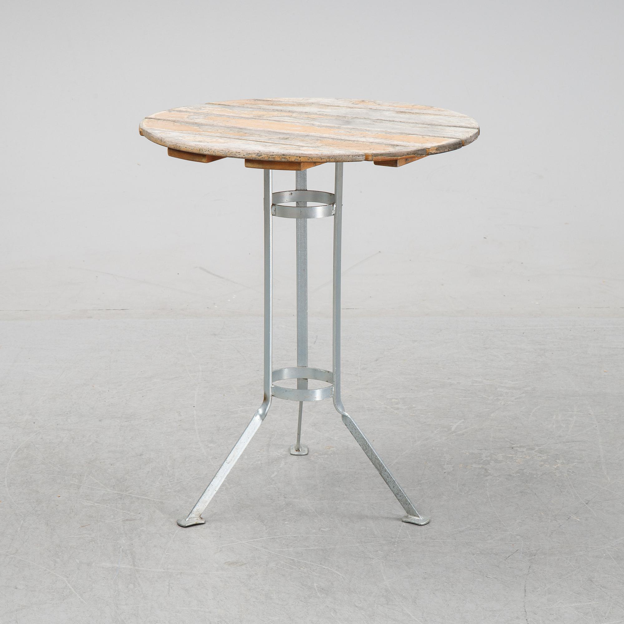 A set of four chairs and one table, Grythyttan, late 20th century.