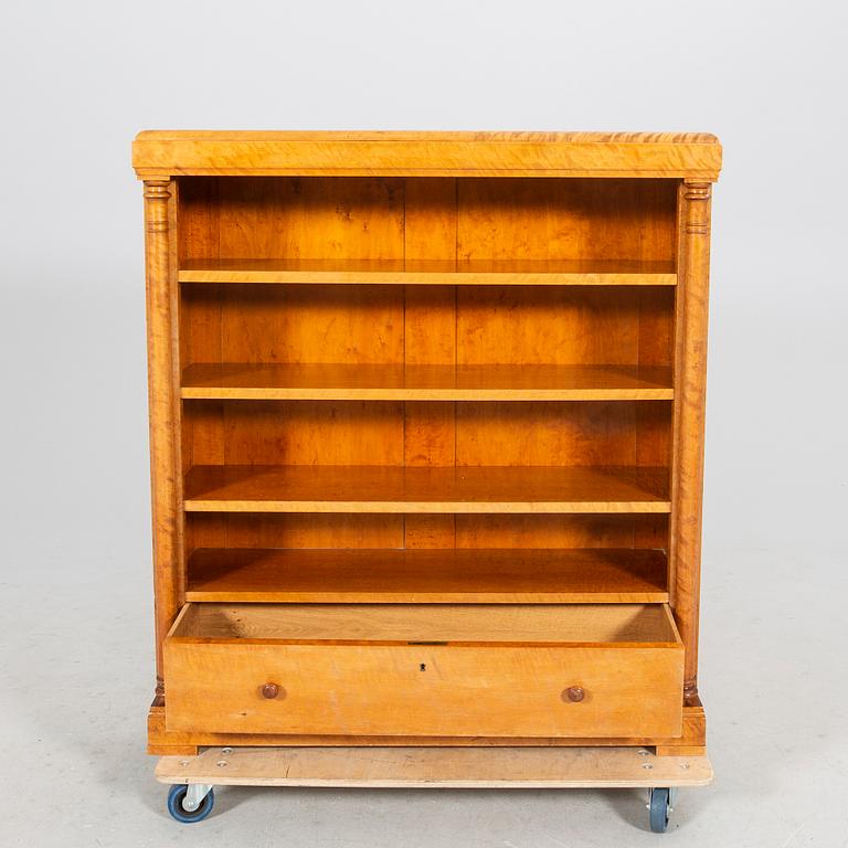 A birch Empire style early 1900s book shelf.