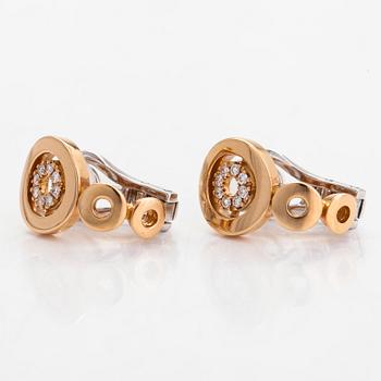 A pair of 18K rose/white gold earrings, diamonds total approx 0.15 ct, Italy.