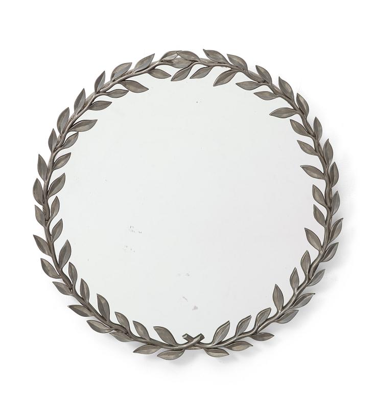 An Estrid Ericson pewter laurel leaves-framed mirror, Svenskt Tenn, Stockholm 1946.