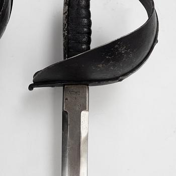 A Swedish pair of military practice swords 1886 pattern.