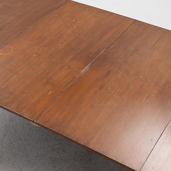 A dining table, England, 19th Century.