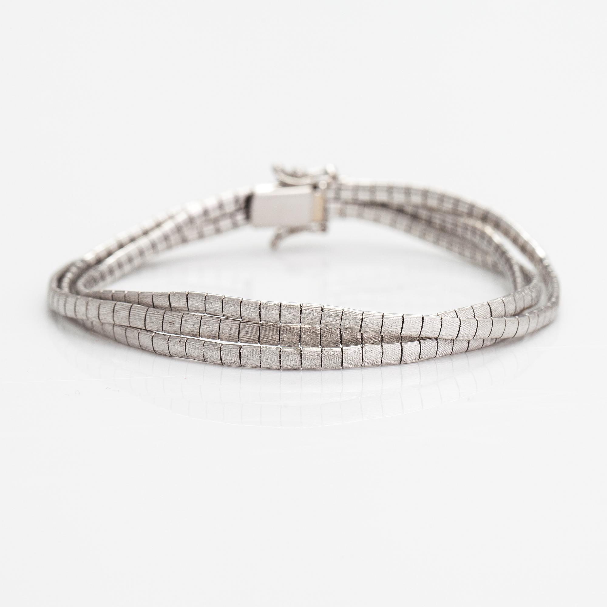 A 14K white gold bracelet. Import marked TIllander, Helsinki 1967.