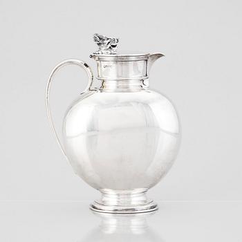 An English silver jug with lid, makers mark Hunt & Roskell Late Storr & Mortimer, London 1881.