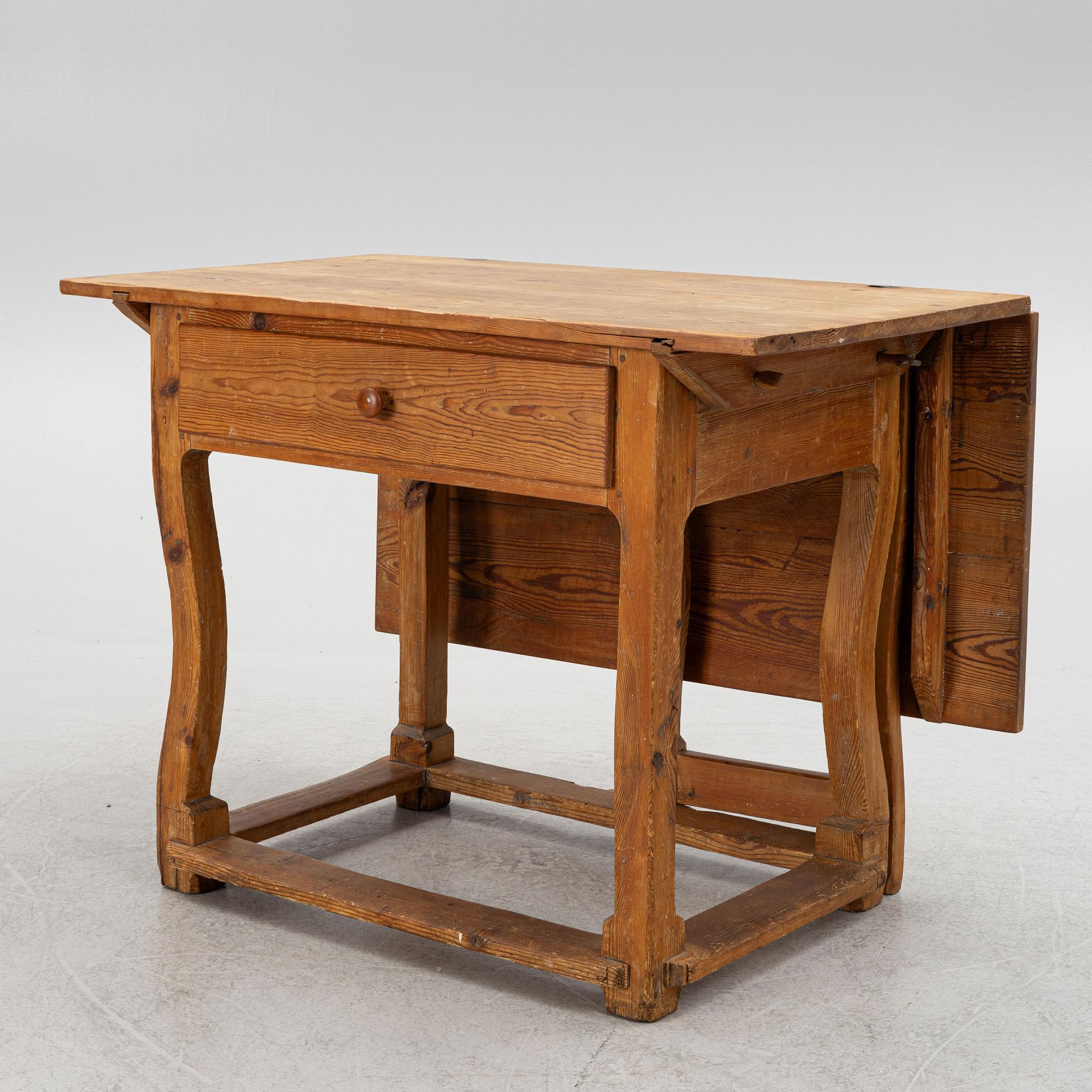 A 18th century gate-leg table.