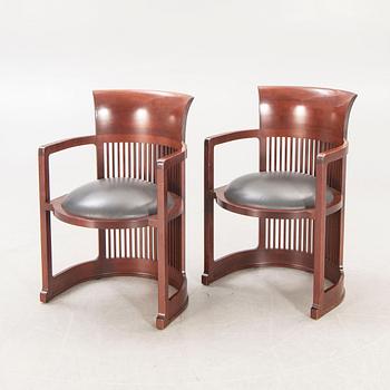 A pair of "606 Barrel Taliesin" armchairs by Frank Lloyd Wright for Cassina 1989, signed and numbered 28459, 28581.