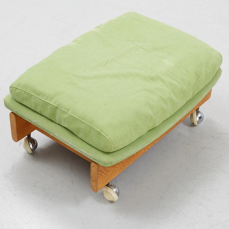 A sofa with a stool, Erik Jørgensen Møbelfabrik, Denmark.