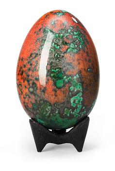 845. A Hans Hedberg faience egg on an iron base, Biot, France.