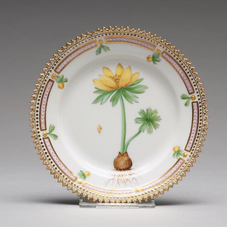 A set of 12 Royal Copenhagen "Flora Danica" bread dishes, Denmark, 20th Century.