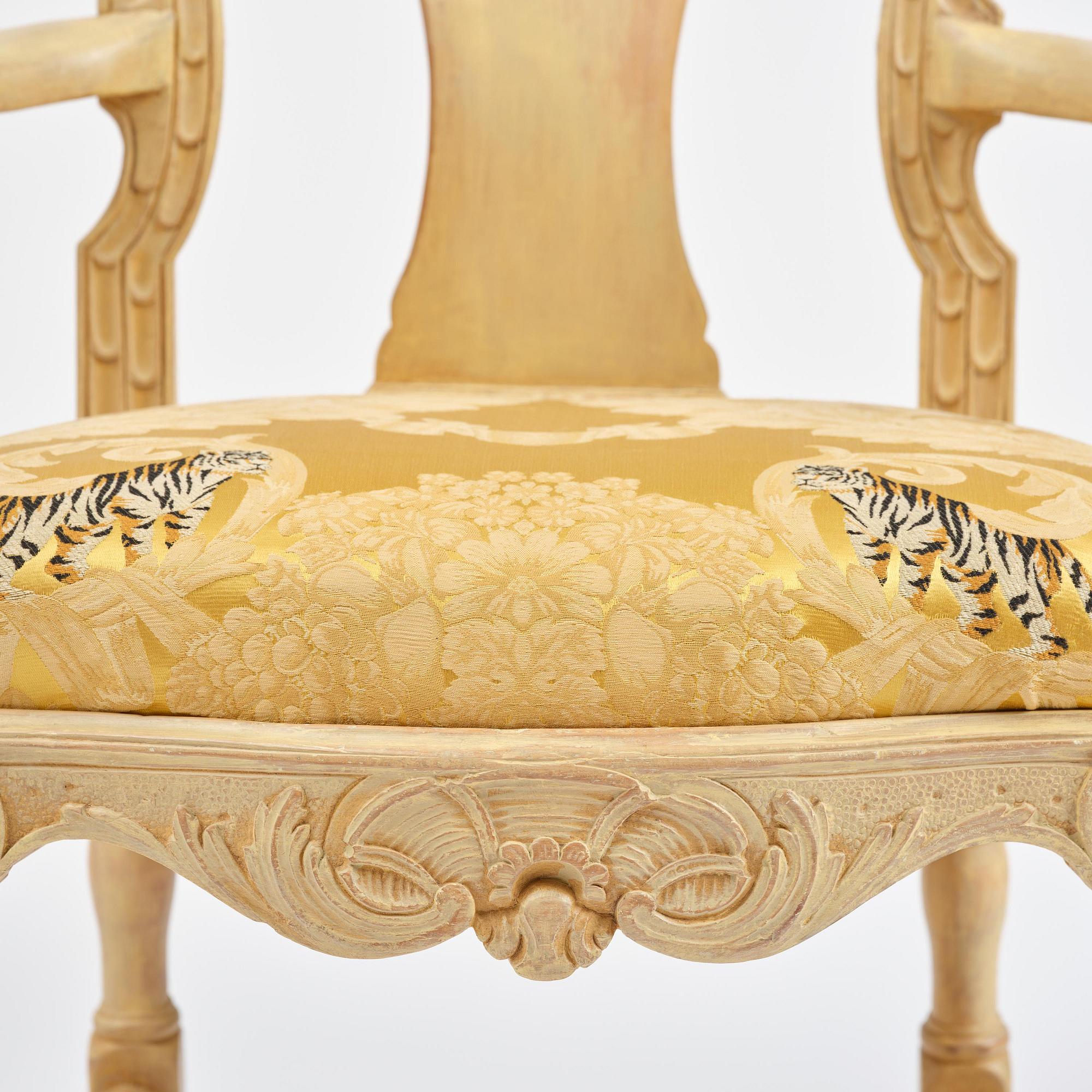 A rococo open armchair in the manner of C M Sandberg, Stockholm, later part 18th century.