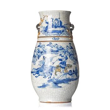 1076. An underglaze blue and enamelled vase, Qing dynasty, 19th century.