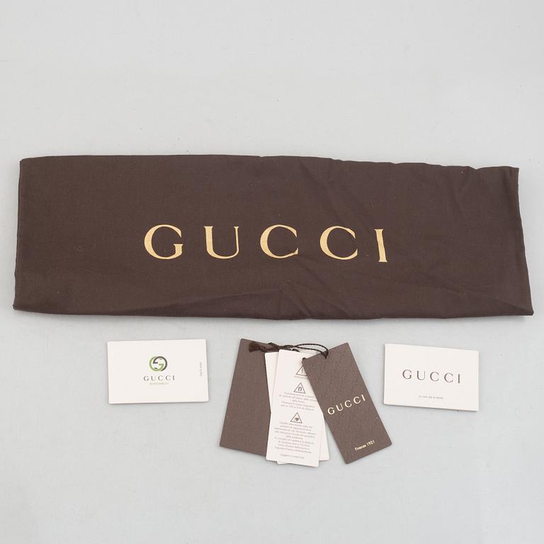 Gucci, "Bamboo Daily Top Handle" bag.