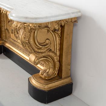 A late 19th century console table with a marble top.