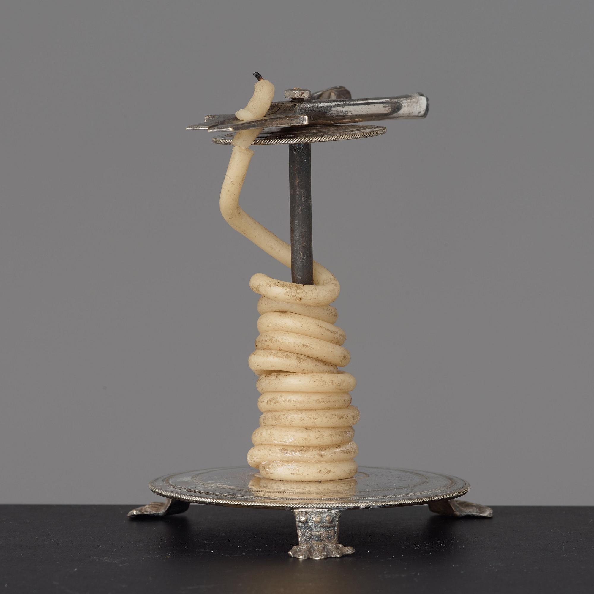 A late Gustavian circa 1800 candlestick.