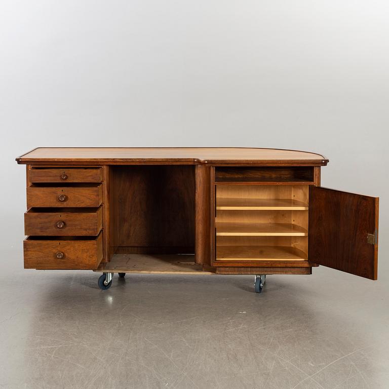 A MID 20TH CENTURY WRITING DESK.