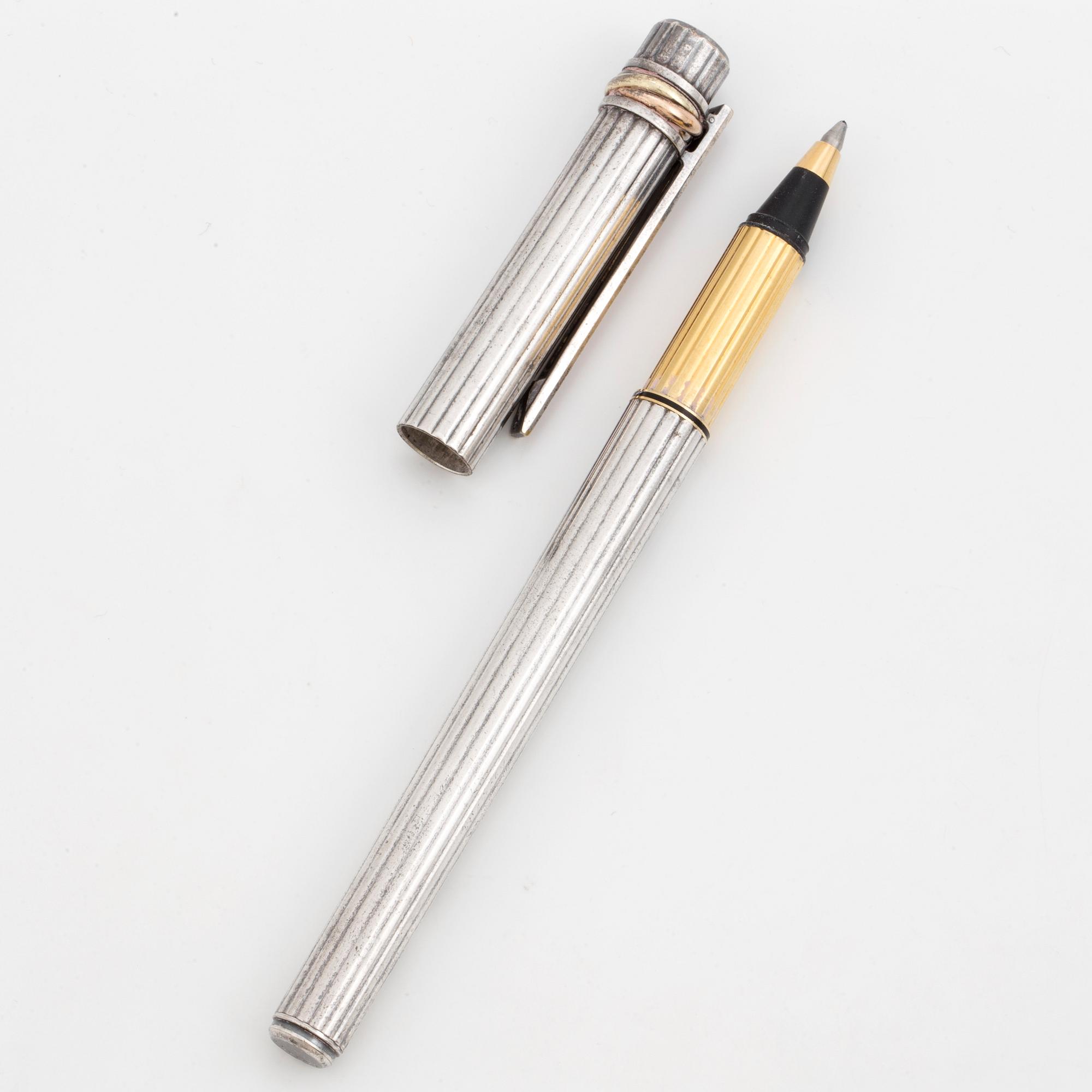 A Cartier lighter and pen.