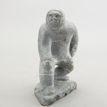 A simon Kristofferson signed stone figurine.