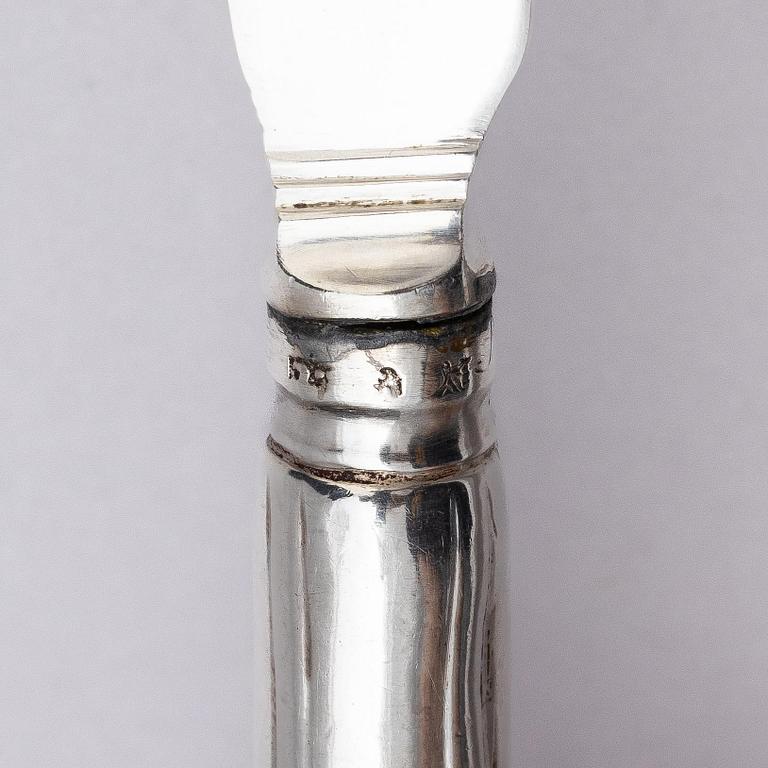 A Swedish set of 19 piece silver table-cutlery, marks of  Isak Trybom, Stockholm 1779-1780.