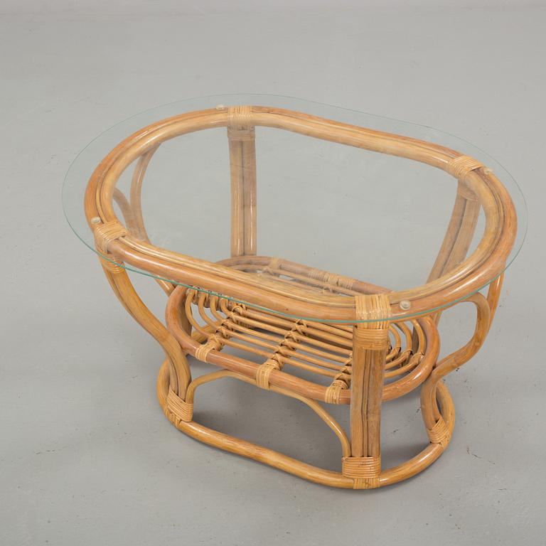 A set of sofa, easy chairs and table in four parts, late 20th century.