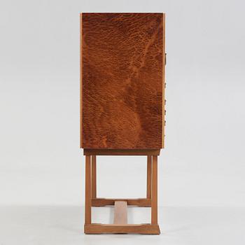 A Josef Frank burr wood, mahogany and walnut cabinet, Svenskt Tenn, model 881.