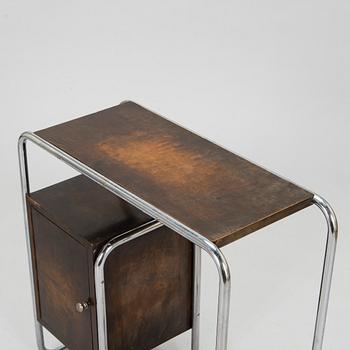 A functionalist style dressing table and chair, mid-20th century.