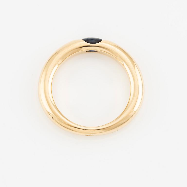 Cartier, ring, "Ellipse", 18K guld med fasettslipad safir.